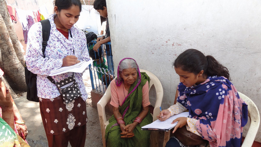 Data collectors test using the Washington Group questions out in the community in Bhopal, India.