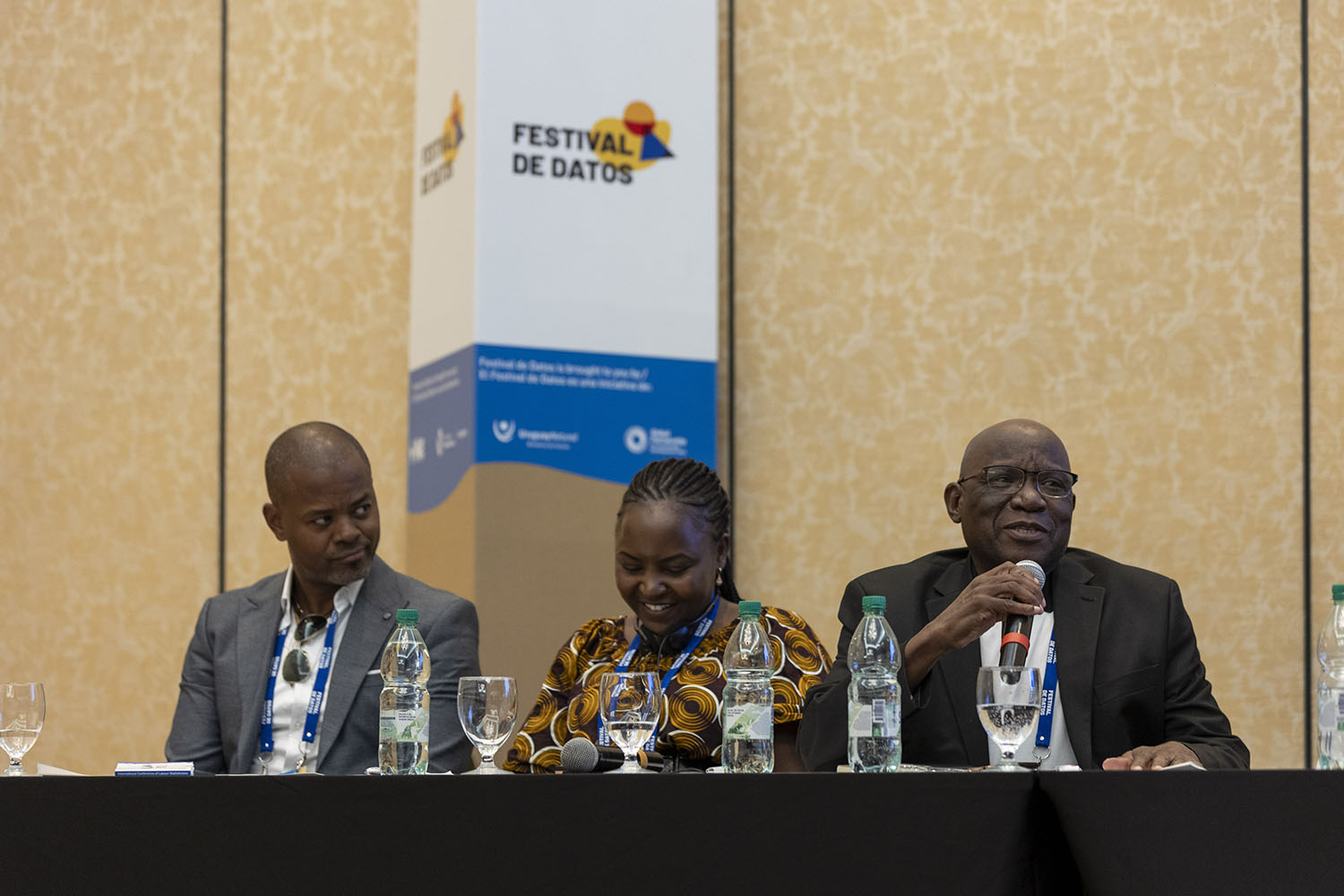 A panel of three speakers at the workshop to discuss progress on the Power of Data High Impact Initiative, at Day Zero of Festival de Datos.