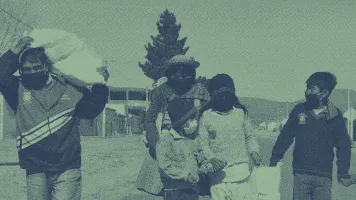 A family receiving supplies for COVID-19
