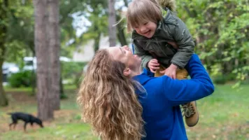 Woman holding child 