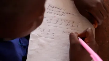 A student working in class in Sierra Leone. Credit: GPE/Stephan Bachenheimer