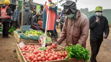 A vegetable hawker at Wangige Market in Kiambu, Kenya. Credit: Elphas Ngugi/Global Partnership for Sustainable Development Data