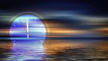 Computer generated image of a clock resting at sea level - credit to Gerd Altmann from Pixabay