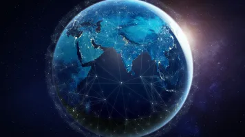 A photo of earth from space with lines illustrating data exchange across continents.