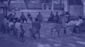 Group of people sitting at a listening group in Kilifi County, Kenya