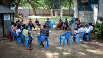 Group of people sitting at a listening group in Kilifi, Kenya