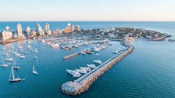 An aerial view of sunset over Punta Del Este harbor in Uruguay