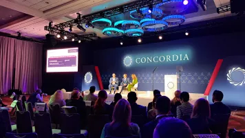 Panel discussion at Concordia 2024 with Alan Davidson, John Giusti, and Claire Melamed