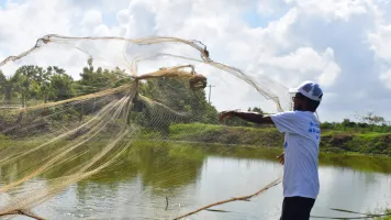 Participant with fishing net