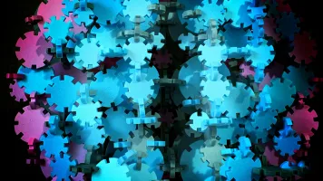 Cogs in a mechanism - Taras Hrytsak / Unsplash