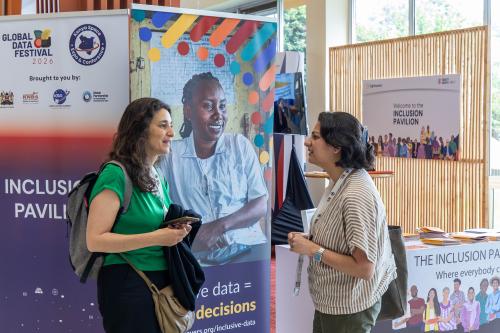 People networking at the inclusion pavilion