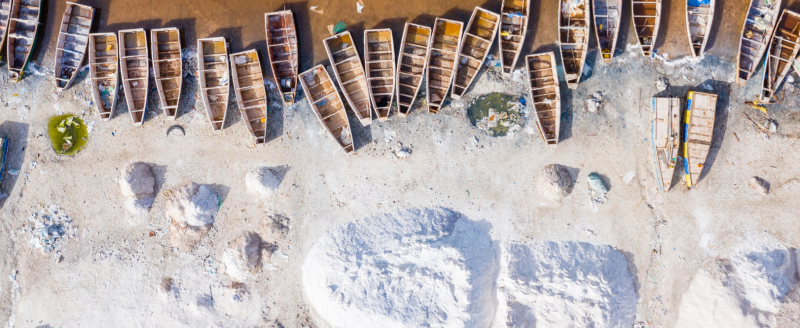 Boats docked on a beach