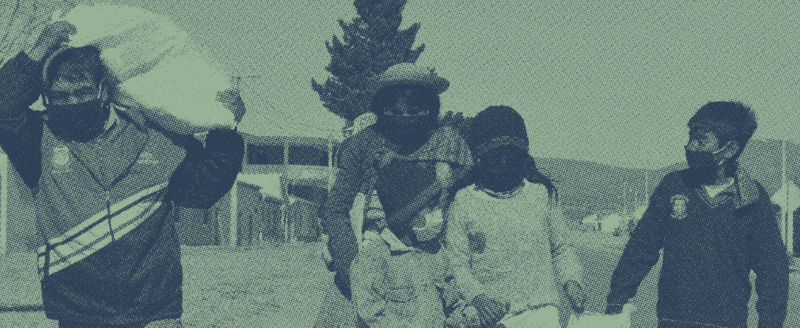 A family receiving supplies for COVID-19