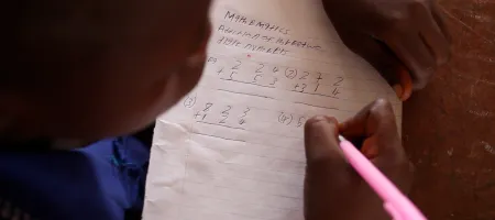 A student working in class in Sierra Leone. Credit: GPE/Stephan Bachenheimer