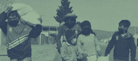 A family receiving supplies for COVID-19