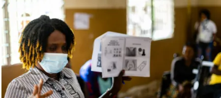 A disability advocate provides advice on contraception to women with disabilities in Sierra Leone through the WISH programme. Credit: Leonard Cheshire