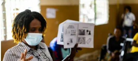 A disability advocate provides advice on contraception to women with disabilities in Sierra Leone through the WISH programme. Credit: Leonard Cheshire