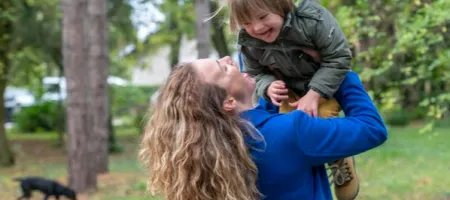 Woman holding child 