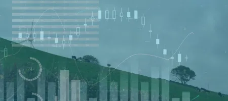 Image of wind turbines moving in countryside and stock exchange graph increasing and decreasing. Global environmental issues and development concept digitally generated image.