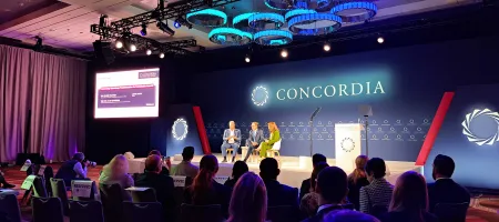 Panel discussion at Concordia 2024 with Alan Davidson, John Giusti, and Claire Melamed