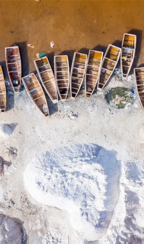 Boats docked on a beach