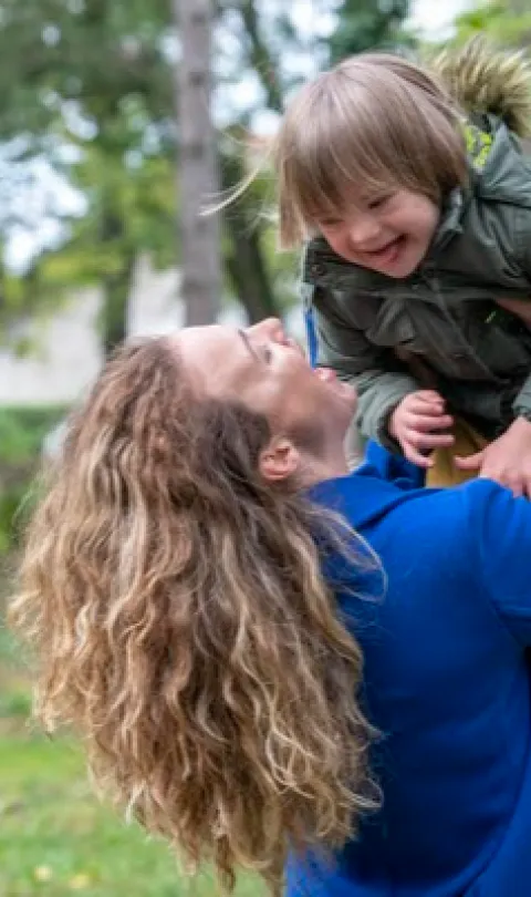 Woman holding child 