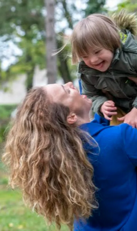 Woman holding child 
