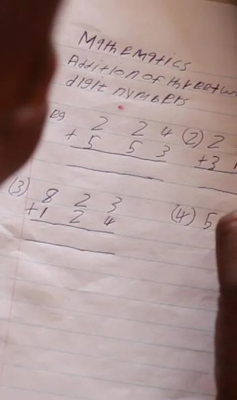 A student working in class in Sierra Leone. Credit: GPE/Stephan Bachenheimer