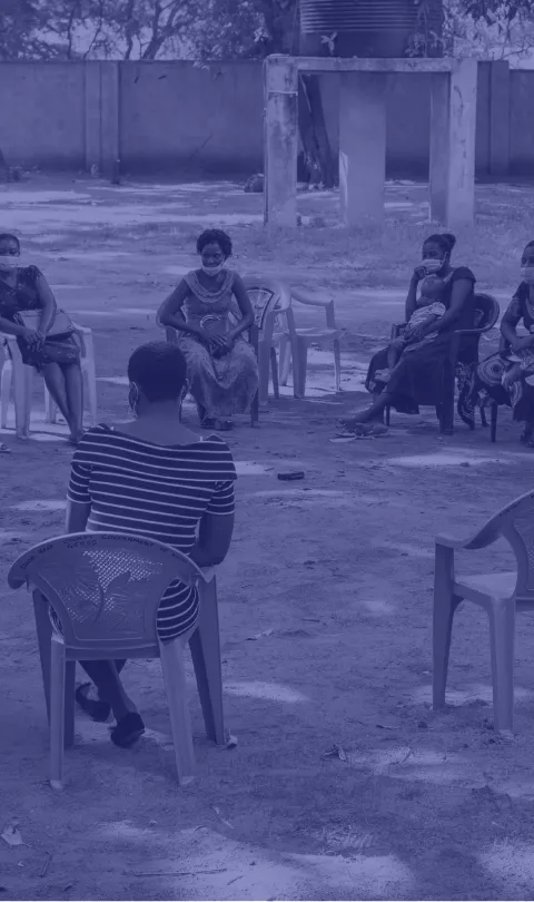 Group of people sitting at a listening group in Kilifi County, Kenya