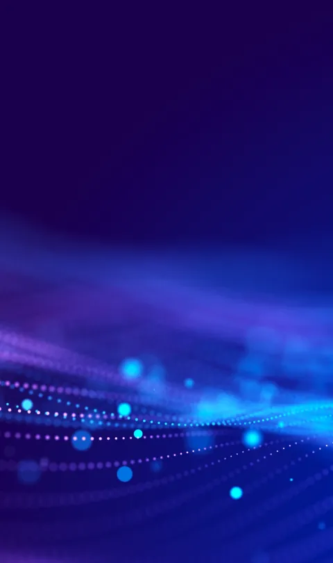 Illustration: Blue and purple lights on a dark blue background to visualize big data