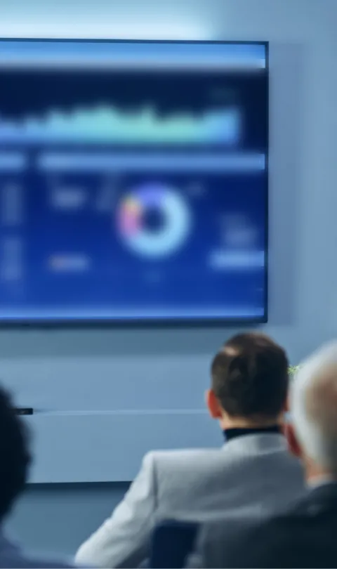 Image of a man presenting a data dashboard / Shutterstock 
