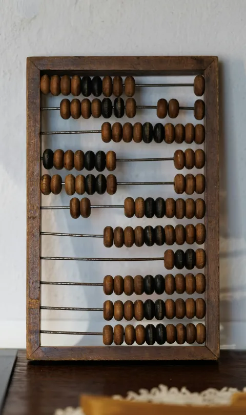 Abacus: Photo by Alexandr Popadin/Unsplash