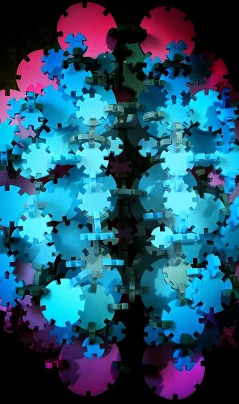 Cogs in a mechanism - Taras Hrytsak / Unsplash