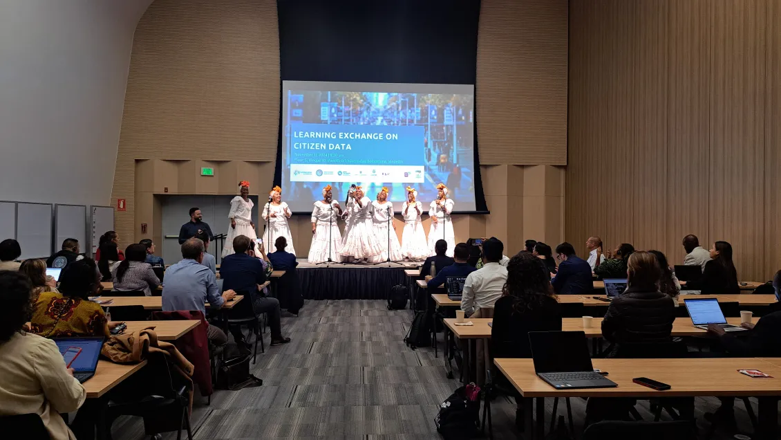 Performers on the stage at the Citizen Data Learning Exchange workshop in Medellin, Colombia.