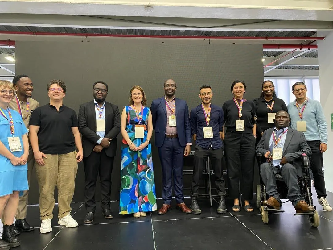 Ronald Kasule, a Data Values Advocate in cohort two, with fellow advocates and speakers at the UN World Data Forum in November 2024
