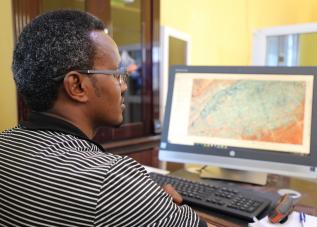 Abdirisak Aden, Head of GIS section at ONS showing the areas effected by the cylone Gati